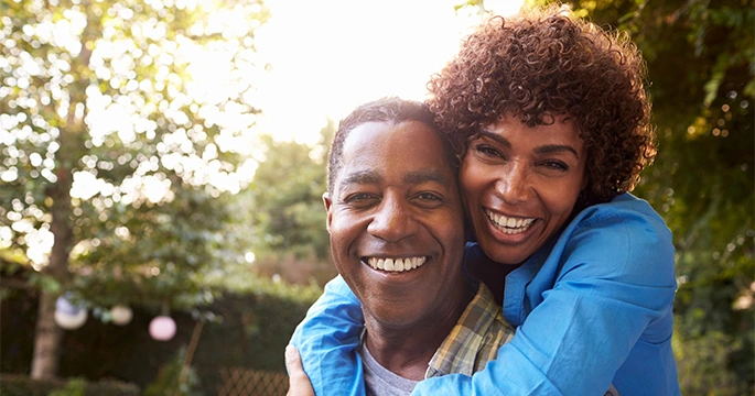 Loving middle-aged couple enjoying life